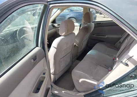 2004 Toyota Camry Le z USA, uszkodzony, nr VIN JTDBE32K540254612